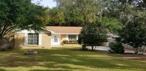 Super Cute renovated cottage in quote location, blocks away from Tom's Bayou. A large entryway greets you as you enter the home and the oversized living area is perfect for entertaining. Open floor plan. The master bedroom has an attached bath and two closets. The second bedroom has a door out to the sunroom. Inside laundry in sunroom and a large storage/workroom behind carport. The storage area/workshop can be accessed from the carport or the backyard which is fully fenced with a privacy fence. Newer HVAC, Carpet, Roof and Paint.