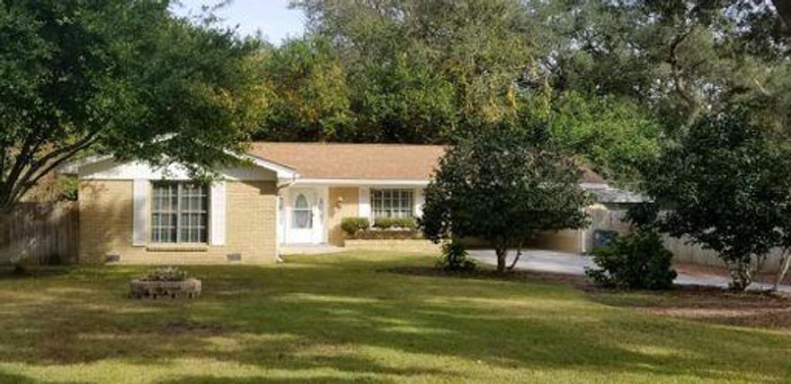Super Cute renovated cottage in quote location, blocks away from Tom's Bayou. A large entryway greets you as you enter the home and the oversized living area is perfect for entertaining. Open floor plan. The master bedroom has an attached bath and two closets. The second bedroom has a door out to the sunroom. Inside laundry in sunroom and a large storage/workroom behind carport. The storage area/workshop can be accessed from the carport or the backyard which is fully fenced with a privacy fence. Newer HVAC, Carpet, Roof and Paint.