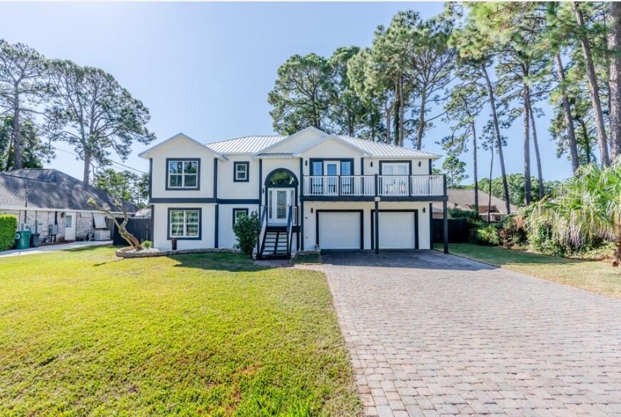Welcome to your dream home in Bay Bridge Landing! This stunning 4-bedroom, 3-bathroom residence offers an abundance of space, including two large living areas and a versatile bonus room. The recently upgraded kitchen features new appliances. Enjoy breathtaking bay views from the master and front bedrooms, and dining rooms.This home is perfectly situated for entertainment, with easy access to Seascape Towne Center, Silver Sands Outlets, and Destin Commons. The beautiful beaches of Destin are just a short trip away. The beautiful beaches of Destin are just a short trip away. Residents also have exclusive access to a community pool, pier, and bay facility.
Additional features include a durable metal roof (2023), new windows, and a refreshed exterior with new stucco. The home also has a new gas water heater (4 years old) and an updated AC unit (6 years old). With a desirable flood zone X rating and the option for short-term rentals, this is an incredible opportunity you won't want to miss.