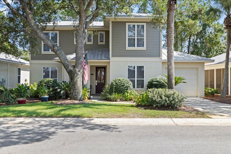 Beautiful furnished home inside and out! 2nd largest floorplan in Crystal Lake Phase 2. Travertine & hardwood floors throughout, granite and stainless steel appliances in the kitchen. The large downstairs master suite has a king bed, master bath has a separate shower, garden tub, double sink vanity and a very large closet. Two oversized gorgeous upstairs guest bedrooms, 1 w/a king bed the other w/a queen. There is an upstairs niche with a charming twin bed, privacy curtains, & a small office nook. There are 3 patio/deck areas, one is screened with privacy curtains.