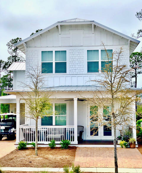 Less than two years old and never rented, this single owner beach getaway is located on a quiet circle in the latest phase of one of the most sought after neighborhoods in Seagrove, this breathtaking beauty has it all - a short walk or bike ride through a state forest trail to the beach, direct access to miles of biking and hiking trails,  even room for a pool overlooking the pond & wooded nature preserve, in your own backyard! One of the most popular floor plans, this immaculate retreat offers 4 bedrooms, 3.5 baths, a spacious keeping room and large covered porch overlooking the beautiful and private wooded area behind the home. The front porch overlooks the green space and the long driveway with extended parking and garage for all your beach toys!