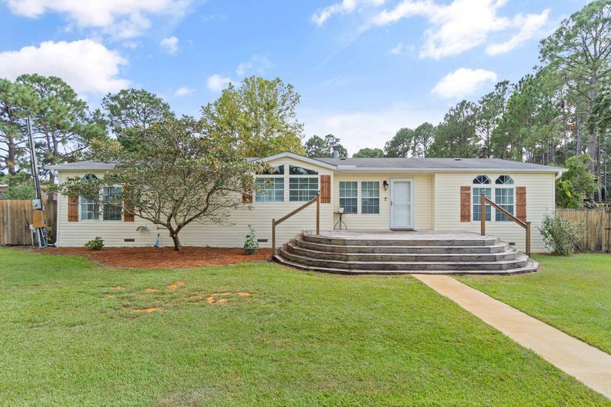 Welcome to this well maintained manufactured home that sits on just over an acre lot! As you enter this 3 bed 2 bath home, you are greeted with a beautiful open floor plan that boasts LVP flooring, built-ins in the great room and a formal dining area. Spend your winter nights next to the propane fireplace in the great room! The large kitchen offers new appliances and plenty of counter space for cooking! The master bedroom has ample space w/ a large closet and includes an en-suite that has double vanities, a large garden tub, and separate stand-up shower! This flat lot has many amenities-to include a 900sq ft shop with power and 30amp RV plug, fully fenced in yard, chicken coop with water,goat pen with water and power, a solar powered electric gate and more. Don't miss this rare opportunit