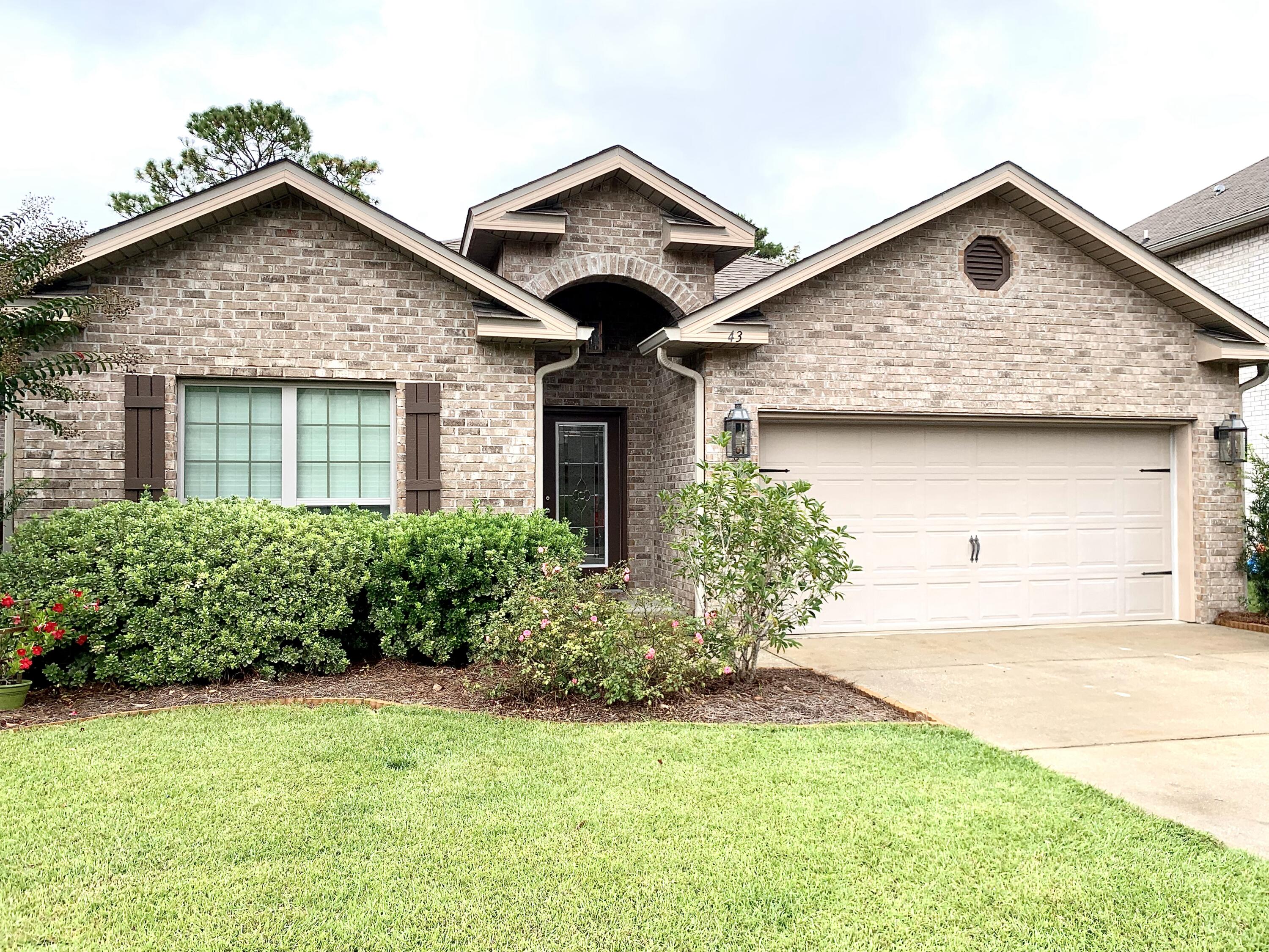 Located in the highly desirable Point Washington! This home is in The Oaks at Eden, a quiet, sought after community close to the bay and the beach with many upgrades by the owner. Open floorplan with 3 beds/2 baths PLUS an office. This home boasts wood flooring, granite countertops, a multi leveled deck in the back yard perfect for outdoor entertaining. Owner is a contractor and has added built-in closets in the master, remodeled shower with glass door, corner bar shelving, back fence and side gate, plug ins moved up for TVs, laundry shelving, new sink faucet and disposal, new dishwasher and fridge, new garage motor and pad, new lighting and chandelier, and a party deck. Recently painted shutters and interior. Comes with hurricane shutters. Close to Bay, Walton, and Dune Lake schools.