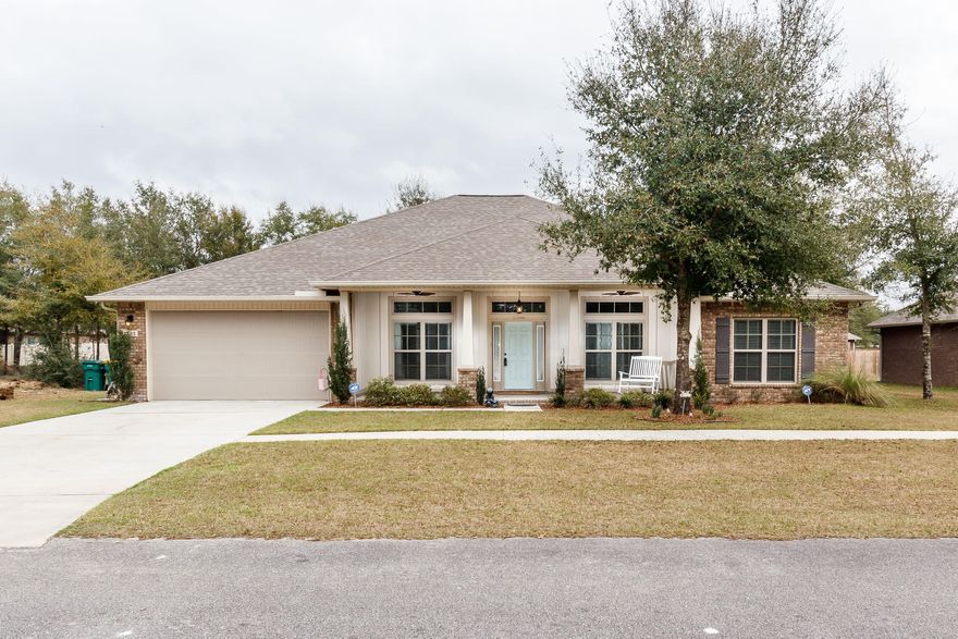 Newly built home w/the perks of custom touches!The well thought out floor plan offers 4 spacious bedrooms, with master bedroom secluded on the left. Bedroom #2 has it's own private bathroom, with access to the FL room, making it the perfect spot for out of town guests or in-law quarters. Bedrooms 3&4 share the large 3rd bathroom of the home. The 15x24 Florida room is generous in size, with sliding doors leading to the 1/3 acre flat backyard, fully fenced and newly sodded. Backyard includes fire pit area, shed with electricity, and is a great spot for relaxing. Kitchen features granite countertops, with hop up bar, custom handmade maple cabinets, and stainless appliances. Tons of custom features sprinkled throughout:barn door, subway tile backsplash, security cameras, fireplace, fixtures