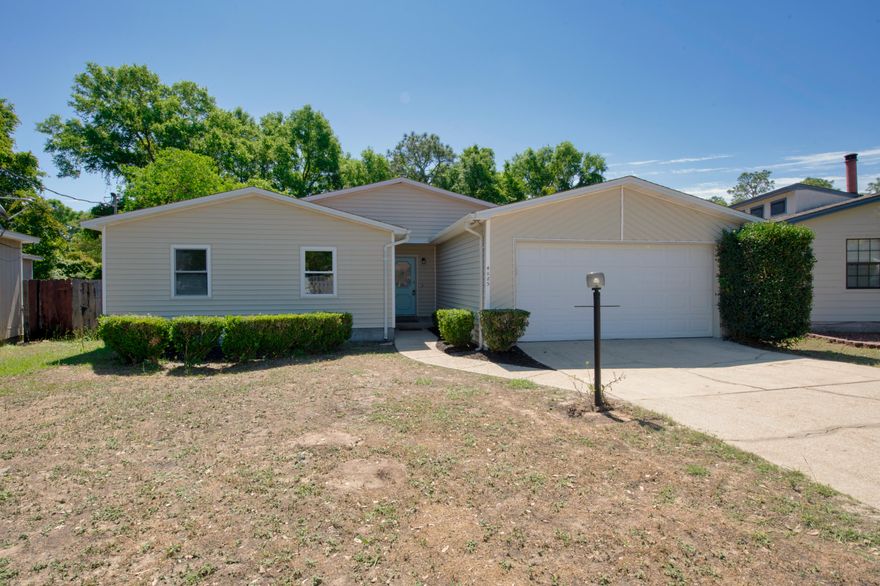 Renovated 3 Bed 2 Home in Pensacola with large yard! The kitchen features NEW White Shaker Cabinets, gorgeous Granite Counter-tops, and Stainless Steel Appliances. The Luxury Vinyl Plank Flooring in living and wet areas ensures low maintenance. The open floor plan's focal point is the beautiful brick fireplace. The master bedroom has an ensuite bath that features double vanities. New Bathroom Vanities, toilets, and Fixtures. This home is Move In Ready. Copper Wiring, Dimensional shingle roof, fresh paint, new carpet and much more! Two car Garage. Great neighborhood and close to Pensacola airport, Cordova mall and military beaches. Schedule your tour today!