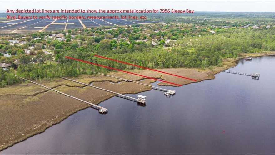 1.8 Acres on East Bay in a cozy subdivision. City water available, tap fee due (contact Holley-Navarre Water for cost), septic needed, no public sewer available. Surrounded by single family homes and lush trees overlooking beautiful sunsets over the bay. Plenty of room to build your home near the front of the lot. Hand clearing permissible over wetland areas. Buyer to verify all information of importance to them, to include any info provided in listing. Lot lines in photos are approx. and intended only to show the approx. lot location.