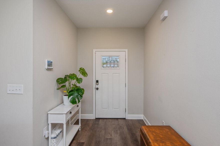 Nestled in a charming neighborhood, this delightful 4-bedroom, 2-bathroom home is a perfect blend of comfort and style. The gourmet kitchen, with quartz countertops and a spacious island, is perfect for culinary enthusiasts. The luxurious master suite features a walk-in shower and a deep soaking tub, along with double vanities for convenience.The backyard is a haven for relaxation and entertainment, with a covered patio and a sprawling lawn for outdoor activities. This home offers a harmonious blend of luxury and functionality, perfect for creating lasting memories.