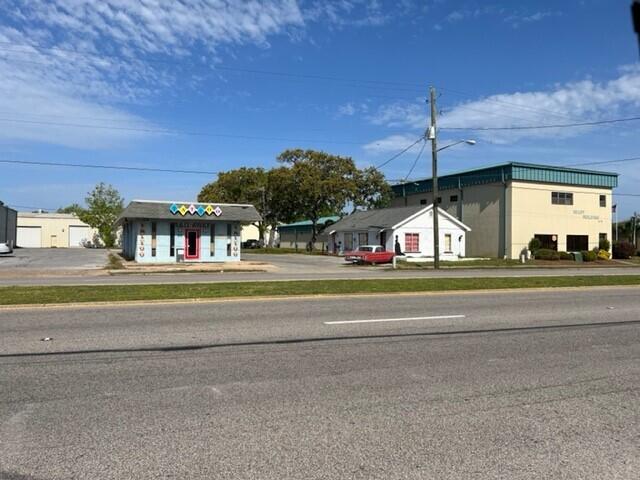 .59 acre parcel that fronts the highway and rear , 2 buildings on parcel, value in the land