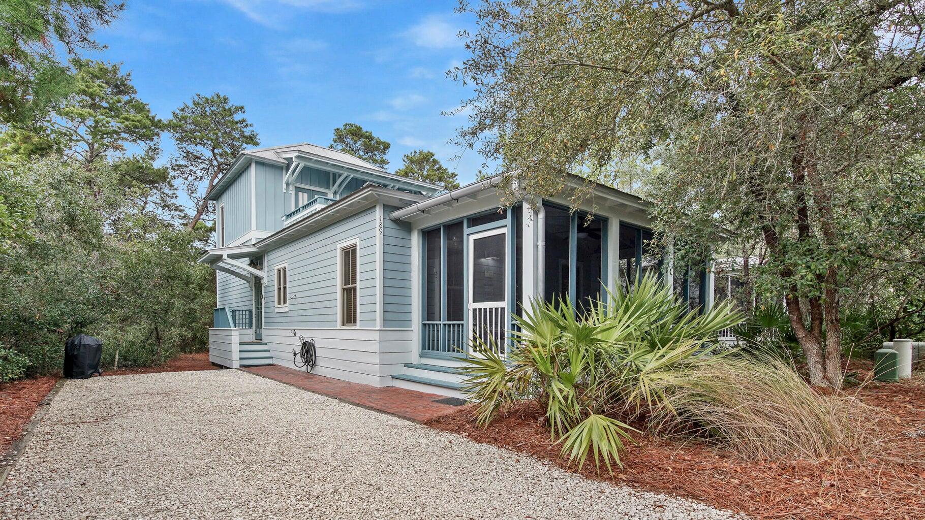 Welcome to Magnolia Cottages by the Sea! This beautifully updated 3-bedroom, 3-bath home in Seacrest is just steps from the community pool and a short 5-minute walk (.2 miles) to the sugar-white sands of 30A.The open-concept layout features a fully remodeled kitchen, hardwood flooring throughout, and tastefully tiled baths. Coastal-inspired finishes and decor create a bright, inviting atmosphere. The main living area flows onto a large screened-in porch--perfect for outdoor dining or relaxing.Upstairs, the spacious primary suite offers a walk-in closet, double vanities, and a private open-air porch. A charming bunk room maximizes sleeping space for guests or family. Ideally located near boutique shopping, award-winning dining, and 30A's best entertainment, this home offers the perfect blend of style, comfort, and convenience. Don't miss your chance to own your piece of paradise!