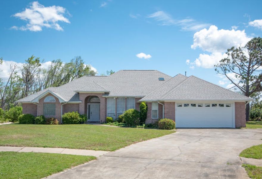 Beautiful 3 bedroom 2 bath all brick home in the prestigious Woods 2 Subdivision. Located on a quiet cul-de-sac, every inch of living space is maximized to make this traditional split bedroom design perfect for entertaining and the growing family. As you enter this home you will be greeted by the large open living room and dining area, complete with custom built-ins, gas fireplace, vaulted/sloped ceilings and lots of windows that offer plenty of natural lighting. The kitchen boasts loads of counter space and cabinets with a large breakfast nook area and pantry. The spacious master suite offers a huge bath area complete with a Jucuzzi tub, separate shower, double vanities and walk-in closet.