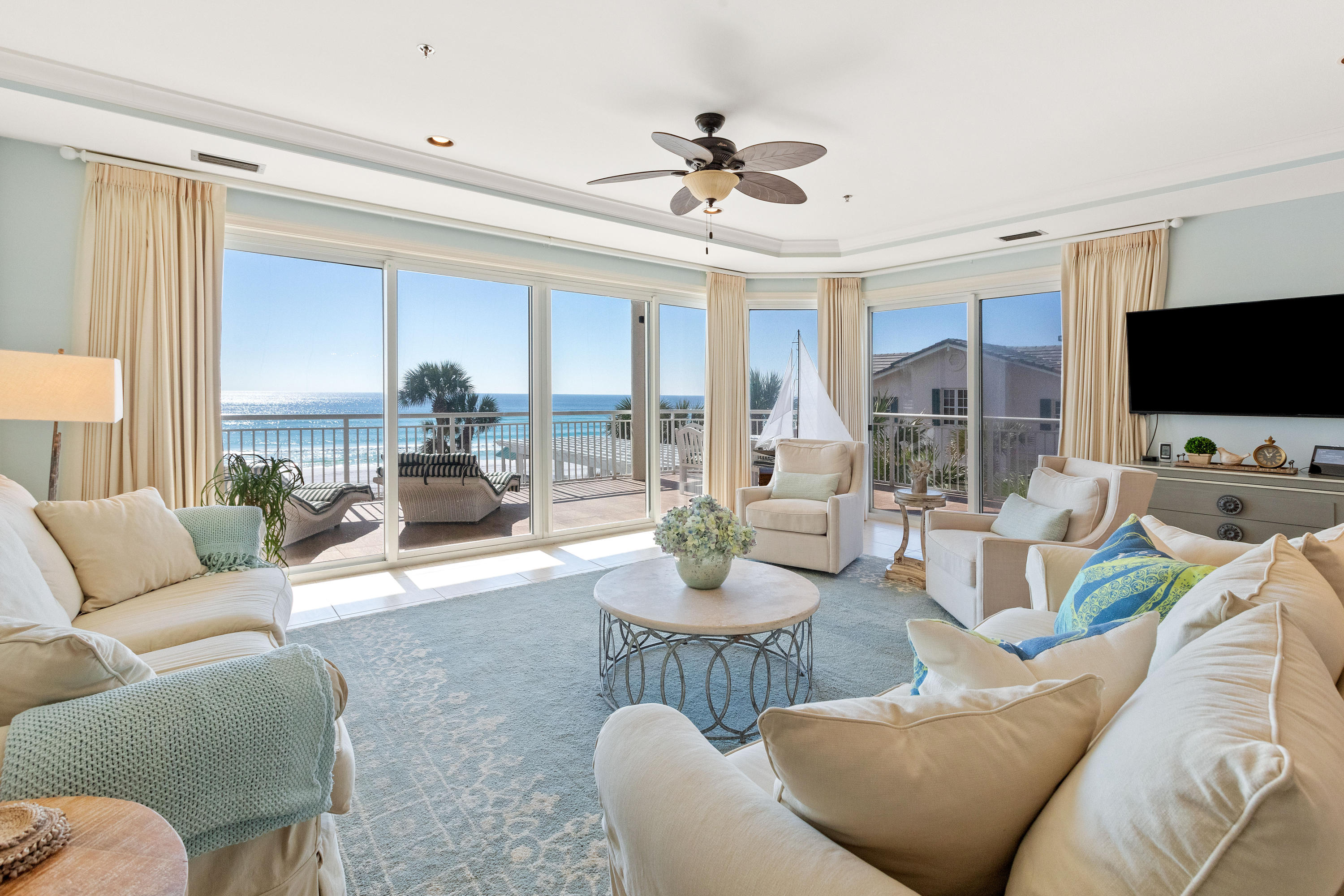 Exceptional Gulf Front living at Grand Villas, a private non-rental gated community within Hidden Dunes in Miramar Beach. Completely upgraded with top of the line furnishings and finishes all included in the purchase. Walls of glass to view the Sun, Sea and Sky. End unit on the West side ensures the ultimate in privacy adjoining the single family neighborhood of Caribe. Expansive covered wrap around balcony. Master faces the Gulf with powered window coverings and Spa bath with Steam shower. Private wing with the 3 additional guest rooms all with full baths. Recent remodel of kitchen and master bath. Elegant lobby, fitness center and community party room all opens onto the pool and entertainment deck with private walkway to private beach.