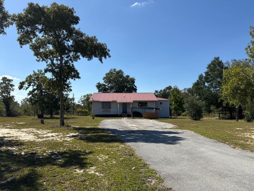 Charming 2-bedroom, 2-bathroom single-family home offering 1,512 Sq Ft. of living space on a spacious lot in Alford, Florida. Located near the scenic McCormick Lake, this property is part of Compass Lake in the Hills, a deed-restricted subdivision with a voluntary HOA. For a small annual fee, residents can enjoy access to two spring-fed lakes with opportunities for boating, fishing, and other water activities. Additionally, the home features a 280 Sq Ft unfinished basement.  Conveniently situated only 14 miles from I-10 and 47 miles from Northwest Florida Beaches International Airport, this home combines privacy, recreation, and accessibility in a sought-after rural setting. Don't miss out on this great opportunity with lots of potential. Schedule your showing today.