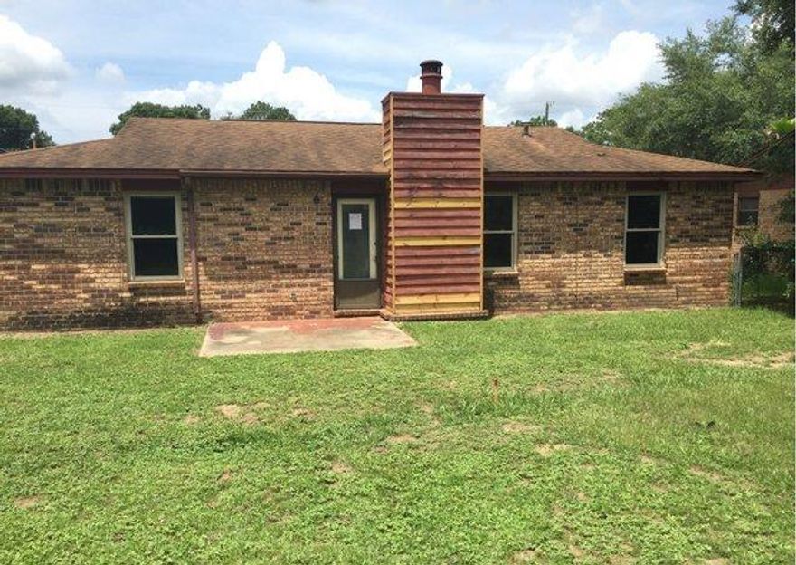 All brick home with lots of potential... 3 Bd / 2 Ba with large fenced back yard. Living room with fireplace & laminate wood floors, galley style kitchen with tile. This property is considered Insurable with Escrow by a FHA Appraiser. Buyers may escrow funds for repairs after the close of escrow & the amount is added to the loan balance of the standard FHA Financing (203b). Please see attached Repair Escrow & PCR for details. Available to Owner Occupants for 15 days from list date.