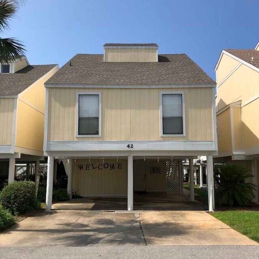 This is a Sandpiper Cove 3Br/2Ba villa plus a  studio unit enclosed at ground level (presently ''gutted''/unfinished). One of 43 freestanding detached houses sited in the middle of the Sandpiper Cove 43-acre tract, particularly convenient to the 1,000-ft boat canal and the 6 tennis courts but also the 9-hole pitch-and-putt golf course and in easy walking distance to cross to the beachfront using the Sandpiper Cove pedestrian-controlled traffic signal ... 5 pools, one with 3 hot tubs ... beach pavilion with full-service food & beverage snack bar ... highly-regarded Louisiana Lagniappe restaurant, harborfront ... boat slips for larger boats, by lease ... fenced & gated with 24-and-7 Security ... Sandpiper Cove is a happy pedestrian-friendly place for beach and boating and other fun.