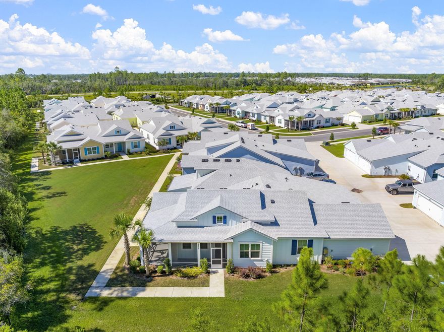 **Charming Dreamsicle Cottage with Private Preserve Views in Latitude Margaritaville Watersound** Welcome to your serene oasis in the heart of the 55+ community of Latitude Margaritaville Watersound! This stunning Dreamsicle Cottage is more than just a home; it's a lifestyle defined by comfort, convenience, and captivating natural surroundings. Nestled on one of the most private lots in the community, this dwelling offers an unparalleled connection to nature, with views that overlook the tranquil preserve, providing a peaceful retreat right at your doorstep. **Exterior and Lanai:** As you approach, you'll be greeted by a meticulously landscaped yard leading to an inviting screened and epoxy lanai--perfect for enjoying morning coffee or evening gatherings while soaking in the beauty of your surroundings. With added features like an extra GFCI outlet, an outside ceiling fan, and recessed lighting, the outdoor space seamlessly extends your living area. Safety and security are paramount, highlighted by the ADT system with 3 Nest cameras and a doorbell, ensuring peace of mind. **Whole House & Garage:** Step inside this beautifully designed home adorned with 8' doors and luxurious faux wood blinds. The elegant 5-??'' baseboards and crown molding throughout the house create a refined atmosphere, while the wood-look tile flooring offers both style and durability. The chef's kitchen boasts quartz countertops and top-of-the-line Whirlpool appliances, complemented by a full-height backsplash and gas drop at the range. The spacious garage features an epoxy floor, overhead storage racks, and a utility sink, ensuring you have ample space for all your storage and organizational needs. **Kitchen:** Cooking and entertaining are a delight in this well-appointed kitchen, equipped with a Whirlpool refrigerator, gas range, microwave, and dishwasher. The island, adorned with two pendant lights, serves as a perfect gathering point for family and friends, making every meal a cherished occasion. **Den:** An inviting den awaits with a solar tube skylight that floods the space with natural light. The custom ceiling fan and recessed lighting create a warm and welcoming ambiance, ideal for relaxation or hobbies. **Great Room:** The great room seamlessly connects with the kitchen, designed for entertainment and relaxation. With recessed lighting and safety features like smoke and carbon monoxide detectors, you can enjoy your time here with confidence and comfort. **Primary Bedroom En-Suite:** Retreat to your spacious primary bedroom, featuring a pocket door leading to the en-suite bathroom, ensuring privacy and convenience. The custom ceiling fan and recessed lighting enhance the tranquil atmosphere, while the elegant shower, complete with wall tile to the ceiling, offers a spa-like experience. Thoughtful details like reading lights and custom wall hooks add to the convenience and charm. **Bedroom 2:** The second bedroom offers comfort and versatility, equipped with recessed lighting and a custom ceiling fan, perfect for guests, a home office, or a cozy reading nook. **Bathroom 2:** The second bathroom features a seamless shower conversion and custom wall cabinets, providing practicality without compromising on style. The tile flooring and wall hooks add a touch of elegance while ensuring functionality. **Laundry:** Enjoy the convenience of an in-house laundry with washer and dryer included, making everyday chores a breeze. **Location:** Situated just a 5-minute golf cart ride from the vibrant town center and public retail, this home offers both the peace of a private preserve and the accessibility to community amenities. Living in Latitude Margaritaville Watersound means embracing a lifestyle filled with fun, friendship, and leisure. Don't miss out on this rare opportunity to own a piece of paradise in one of the most sought-after communities. Schedule your showing today and experience the magic of the Dreamsicle Cottage
WARRANTY:  Enjoy peace of mind with the remaining transferred 2-10 Warranty (2 yrs Workmanship, 2 yrs Systems & 10 yrs Structural from original build date)