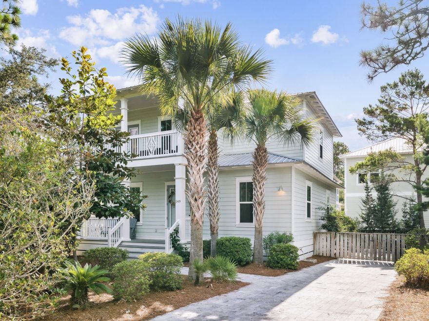 This inviting coastal cottage offers the quintessential beach lifestyle just steps from Eastern Lake and minutes from sugar-white sands. Spanning 2,067 square feet of heated and cooled living space, plus an additional 240 square feet of porches, this home provides ample room for relaxed gatherings and quiet retreats alike. Inside, an open-concept first floor welcomes with 10-foot ceilings, hardwood and travertine flooring, and a thoughtfully updated kitchen outfitted with stainless steel appliances and gleaming white Carrara marble counters. Remote-controlled thermostats add modern convenience. The dining area comfortably accommodates 10, with additional seating available at the kitchen bar. The floor plan features four bedrooms, ideally suited for family living or as a high-performing vacation rental. The first floor includes a queen guest room and a charming bunk room with two twin XL-over-twin XL bunk beds. Upstairs, two serene king suites await  one with a private balcony and a spa-worthy bath showcasing marble floors, a freestanding tub, and a rainfall shower. 

Multiple porches and outdoor living spaces invite peaceful mornings with coffee and birdsong or lively evenings grilling and gathering beneath the stars. Citrus trees just outside the back door add a fragrant, seasonal touch. A travertine paver driveway and patio frame this beautifully maintained home, which boasts numerous recent upgrades, including new appliances, fresh exterior paint, stylish furnishings, and new window treatments since 2020.

Perfectly positioned on the coveted south side of 30A, just across from public lake access and a short stroll to a large community pool, this residence offers immediate proximity to bike trails, Greenway Station, and the best of 30A's dining, shopping, and outdoor adventures. A lovely coastal retreat with strong rental potential and effortless access to both beach and dune lake allure.