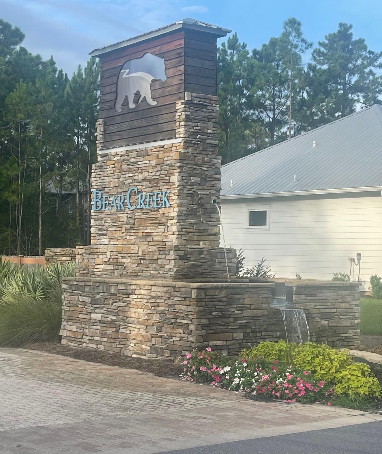 This is an amazing opportunity to build your Craftsman-style dream home in the premier community of Bear Creek. Current amenities include Tennis courts, pickleball courts, a basketball court, a Swimming pool, a playground, and a gym. This gated community tucked away among mature hardwood and natural waterways promotes a carefree Florida lifestyle with the advantages of living on the Emerald Coast. This is a non-short-term rental community. Short drives to shopping, dining, golf, and beaches along 30A. Phase III of Bear Creek is opening up soon to include more Pickleball courts and a larger pool.