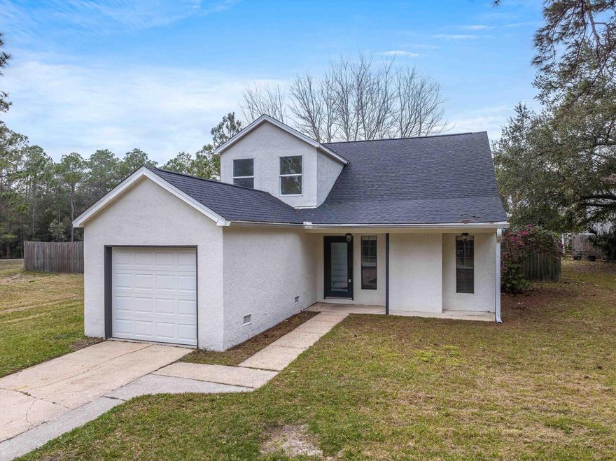 Rare opportunity to live on one of the most sought-after waterfront communities! This 3/2 home features a brand new roof, exterior paint, LVP flooring and dock! The kitchen features exquisite Thomasville Cabinetry, pantry with slide out shelves, granite tops and new stainless steel appliances. The master bedroom features a walk-in closet, a master bath and French doors leading to the concrete patio, overlooking the private pond. The built-in electric fireplace adds a modern aesthetic to the main living area, perfect for entertaining. Upstairs there's 2 bedrooms and a full bathroom with tiled-in shower, plus an open loft with its own balcony access. Neighborhood amenities include community pool, clubhouse, pier, boat launch, tennis court and deeded water access to the Intracoastal Waterway.