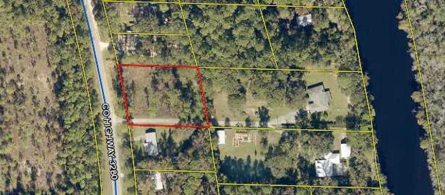 Large lot .94 acre lot with 175Ft of road frontage on HWY 3280. Lot is only .2 mile from the public boat launch on Black Creek! From this boat launch you can travel down into the Choctawhatchee Bay within a matter of minutes.