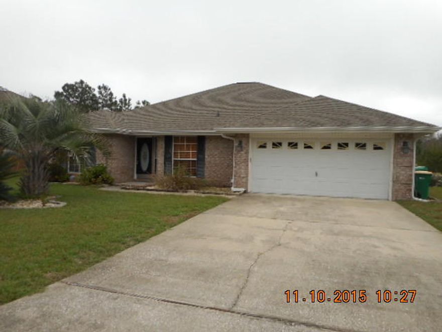 Beautiful home in Navarre! Open floor plan with 4 bedrooms. Bedrooms have carpet and the rest is hardwood laminate and tile. Kitchen has island and breakfast bar with stainless steel appliances. His and hers walk in closets! Smart thermostats throughout home to make it more energy efficient. Good sized deck in back for entertaining. Pet may be considered with owner approval and payment of a non refundable pet fee. There is no fence! No smoking inside home or garage.