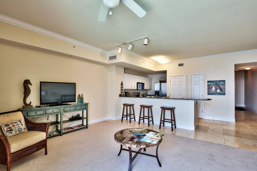 OWNER FINANCING OFFERED! ATTRACTIVE TERMS! Tidewater 2803 is a penthouse unit, just purchased BRAND NEW in 2012 and is in impeccable shape. Penthouse units feature higher ceilings, travertine tile floors and stainless appliances. The ''H'' floor plan is the largest of all one bedroom floor plans in the building and features built in hall bunks, a nice size kitchen with granite countertops overlooking the living area and the balcony. This condo also boasts two full baths and is being sold fully furnished and rental ready. Tidewater is one of the best buildings on the beach featuring amenities that the whole family can enjoy! The property is highlighted by a gulf front fitness facility, 4 hot tubs, 2 HUGE outdoor pools, 1 indoor heated pool, 2 game rooms, sauna, steam, restaurant & more!