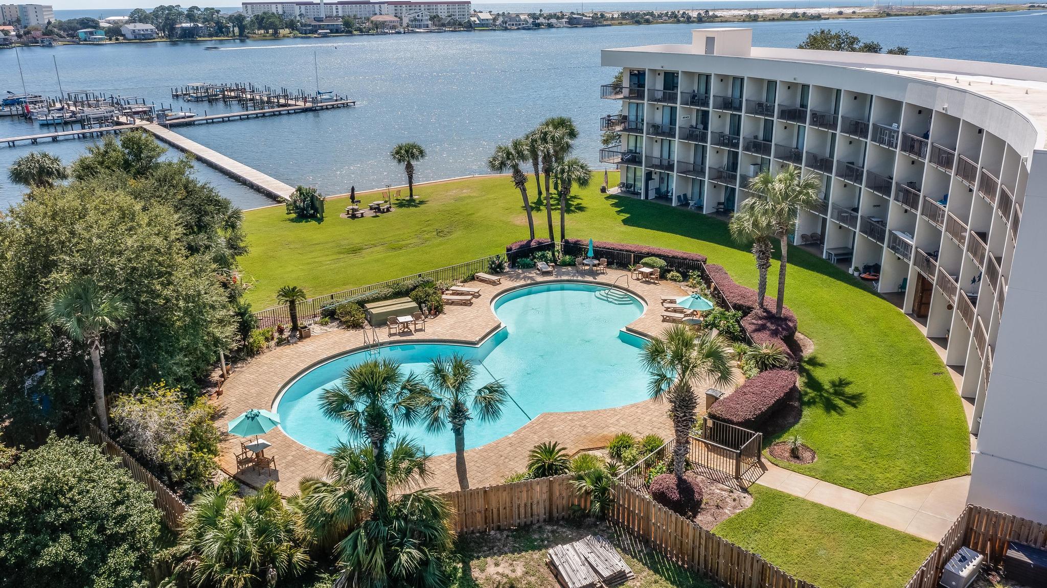 Welcome to Unit 306B at Pirates Bay. This fully furnished studio unit is rental ready. Features a cozy sitting area that transitions into the bedroom. Off of the sitting area is the balcony that overlooks the pool and private marina. Included is a 28ft boat slip E14, that can be rented out for extra income.