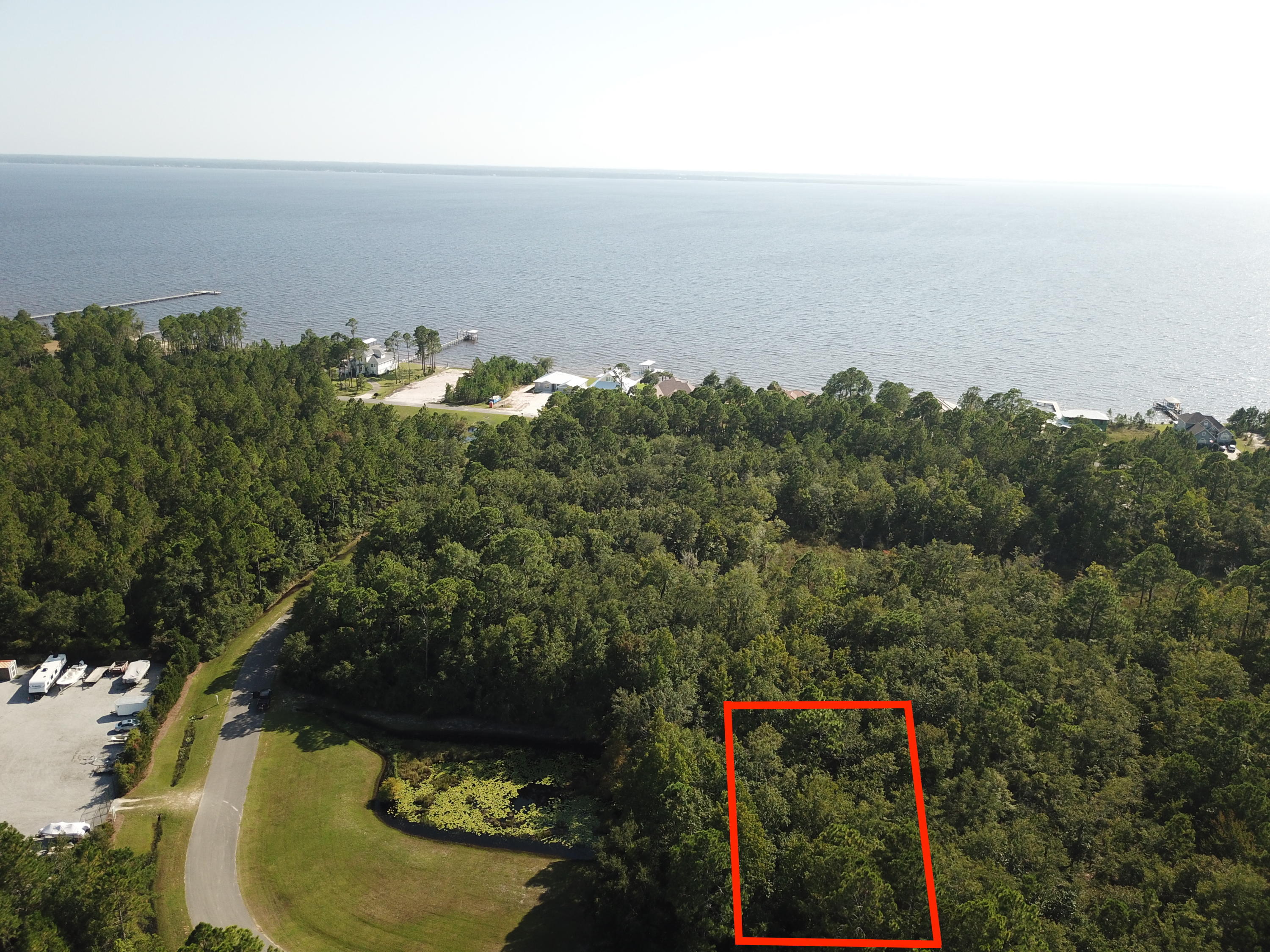 Build your bayside dream home on one of the largest oversized lot in Bay Harbour. Quite private neighborhood with many stunning custom homes currently being built. Bay Harbour features community dock, tennis court, boat Storage, and acres Of preserved areas To enjoy the outdoors. Lot 67 adjacent to the property can be purchased together or separated.