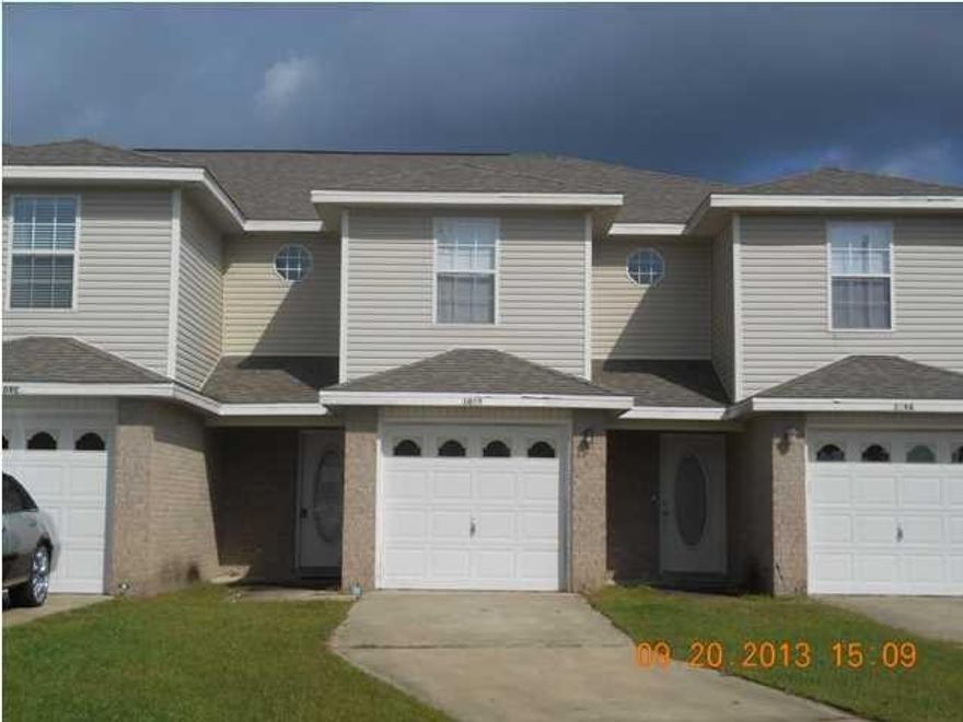 Largest of the units, Spacious and completley updated: new plush carpeting, newly painted , new custom kit cabinets and vanities, custom granite counters and breaskfast bar, top of the line Samsung Stainless Steel appliances;Smart screen camera fridge, stove, microwave and dishwasher, Hardwood like ceramic tile downstairs...Comfortable floor plan, huge master suit and sep guest brm with its own full bath. Half bath downstairs large living room , suitable kitchen with breakfast bar . fenced small back yard. Close to mall shopping beaches and both bases.easy show, see agent notes.