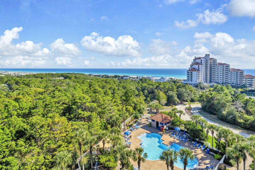 Beautiful expansive coastline views of the Gulf of Mexico and Topsail Hill Preserve State Park from this lovely 8th floor lock out condo.  Stylish  and renovated  with , LVP flooring throughout,  granite counters, open kitchen and S/S appliances.  Glass and tile shower in the master bath. Shower tub in the guest bathroom.  Both are updated with matching granite vanities  and high end fixtures.    2 bedroom 2 bath and kitchen on one side and a large studio with a kitchenette on the other  Each has its own balcony. Enough room for the whole family to make vacation memories and you can also cash in $$$ on vacation rentals. 600' of  beach , pools, tennis (clay courts), fitness center, racquet ball, onsite restaurants , and many other fabulous amenities. Tops'l resort has 52 acres of beautifully landscaped property with many fun attractions in the area. 