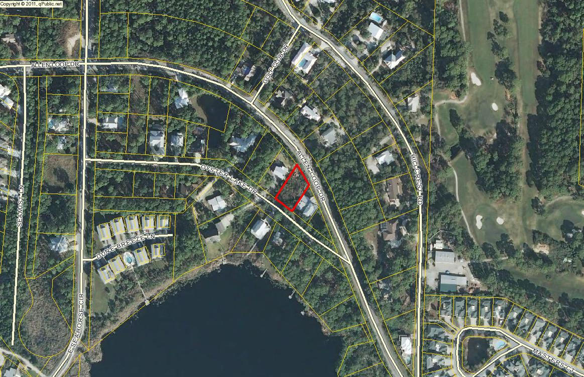 Vacant building lot close to the beach, golf club & Oyster Lake. Beach access is only a few blocks away!
