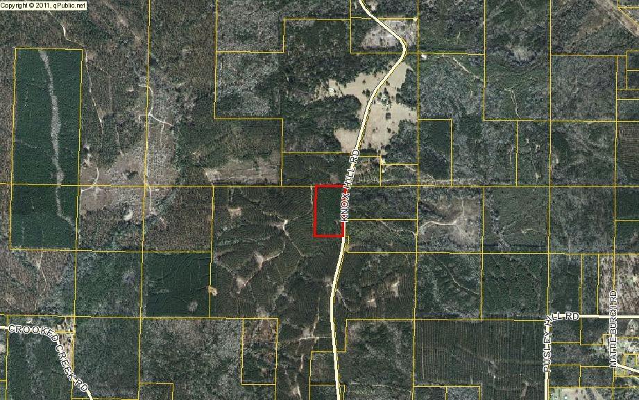 MOTIVATED SELLER! Desirable acreages (over 13) acres with plenty of road frontage and still plenty of trees. This parcel would make an excellent home site that is peaceful and quiet, yet only minutes to town. The hunting is good here and there are very few neighbors, so come make this what you want. Old well & concrete pad on property - unknown condition.