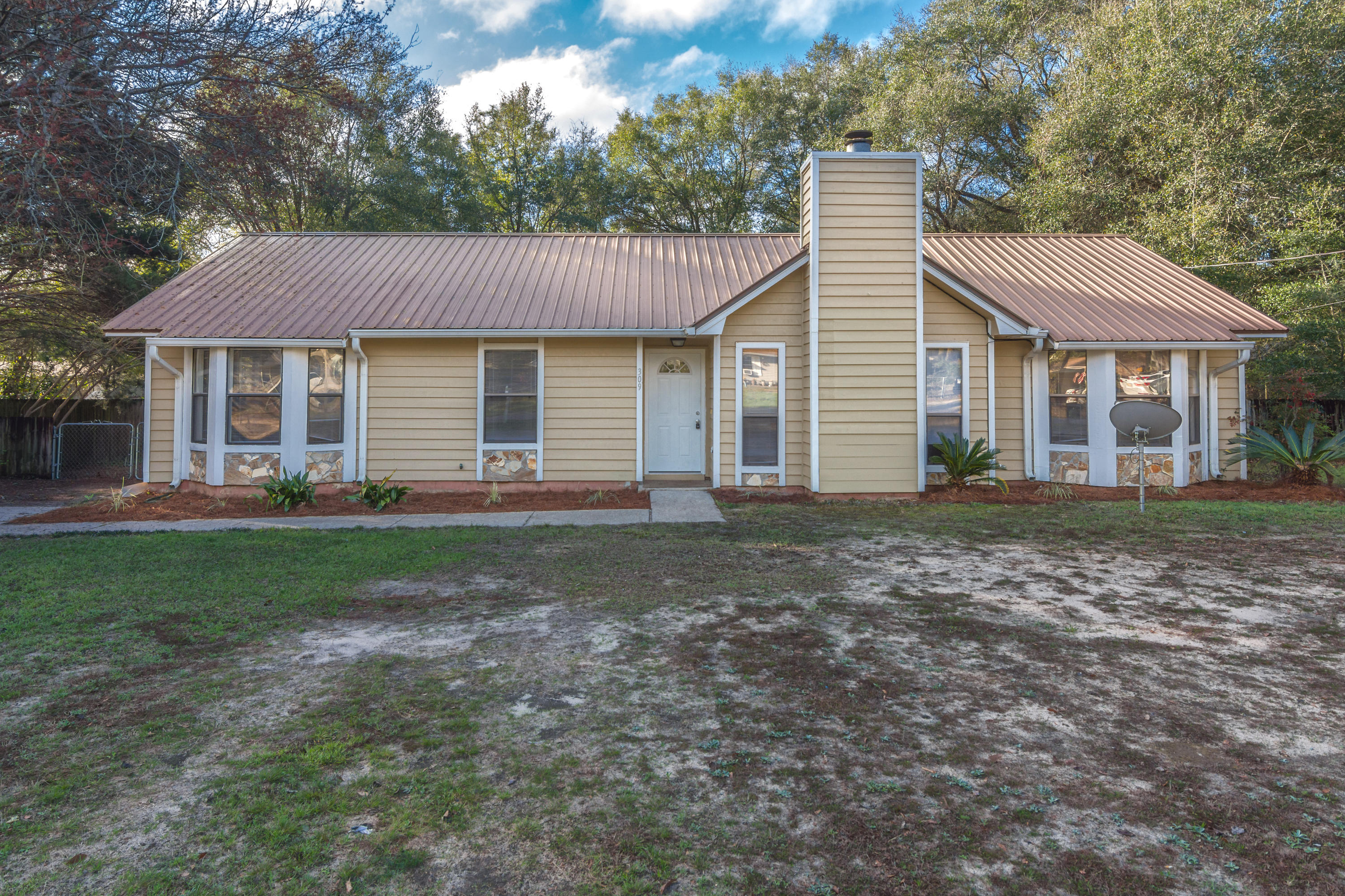 4 Bedroom 2 bath move in ready home located in the middle of Crestview with easy commute to the local bases, beaches and shopping centers. Homes boasts a large living room, ample cabinet and counter space for all your cooking needs and split floor plan allowing privacy. There is a large fenced in back yard for the kids and family dog to play in. There is a metal roof to protect your investment along with a septic and drainfield that were replaced in 2016. HVAC installed in 2009. Carpet and exterior doors replaced 2 years ago. Home was recently inspected by a licensed home inspector and repairs are being completed.