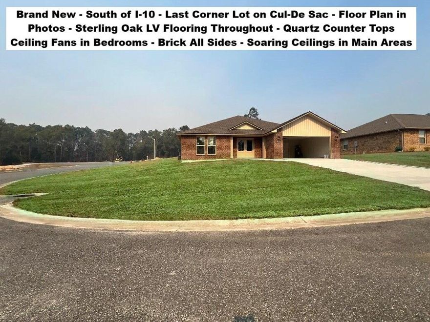 South of I-10, CORNER Lot, Cul-de-Sac Street. FLOOR PLAN IN THE PHOTOS. Brand New BRICK Home with 4 Beds, 2 Baths, 2 Car Garage. STERLING OAK LV Flooring THROUGHOUT the entire house. Kitchen with SHAKER WHITE Cabinets, Quartz COUNTER-TOPS, Large Single Bowl Under-mount Sink, WALK-IN PANTRY - STAINLESS STEEL Range, Dishwasher, and OTR Microwave. Dining with 2 Slider Doors, Oversized 9 LIGHT CHANDELIER & Spacious Living Room with 66-inch Ceiling Fan & Soaring Ceilings. MASTER SUITE with Double Quartz TOP VANITY - LARGE Walk-in Closet, SEPARATE Tub and Shower & Private Water Closet.  ALL Bedrooms have Ceiling Fans and there is zero carpet in this home.  BUILDER PAYS MOST CLOSING COST, ASK FOR DETAILS. Astroguard Hurricane Fabric is included with this home. Garage Door Opener with MyQ App Access. THE SUBDIVISON OF CAMILLE COVE IS IN A GREAT LOCATION ON THE South End of Crestview and CAN BE ACCESSED BY TURNING AT THE 1ST RED LIGHT ON THE SOUTH END OF CRESTVIEW. We have more homes under construction. If you are Traveling from Niceville, Eglin, Duke, 7th Group, Hurlburt, or Fort Walton Beach you will be able to Turn at the 1st Redlight on the South End of Crestview to Access Camille Cove. Close to Shopping & Restaurants. More New Brick Homes Under Construction, Estimated Completion Time End of March to April. Buyer to verify measurements, school zones, and other items of importance to the buyer. 