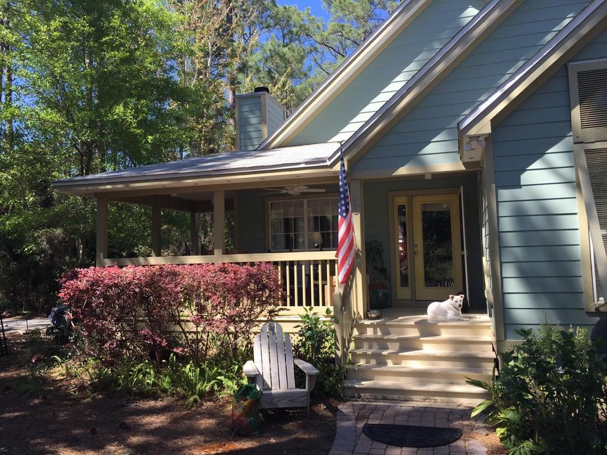 Behind the privacy of a white picket fence and a mature stand of pines, magnolias, and ornamentals sits 33 E. Georgie, a quaint Florida cottage situated on TWO double lots. The property belongs to the original owner of the house. It is immediately obvious upon viewing that the home and grounds have been thoughtfully built, and meticulously cared for and maintained. Magnolia Beach is a community prized by ''those in the know'' for its character, charm, and seclusion from the hustle-and-bustle. This property may be its best example. Opportunities abound to further develop the land, as there is ample space for new structures or features. If fully subdivided, the current property could take 4 houses... That is, if one ever had the heart to break up such a unique corner compound.