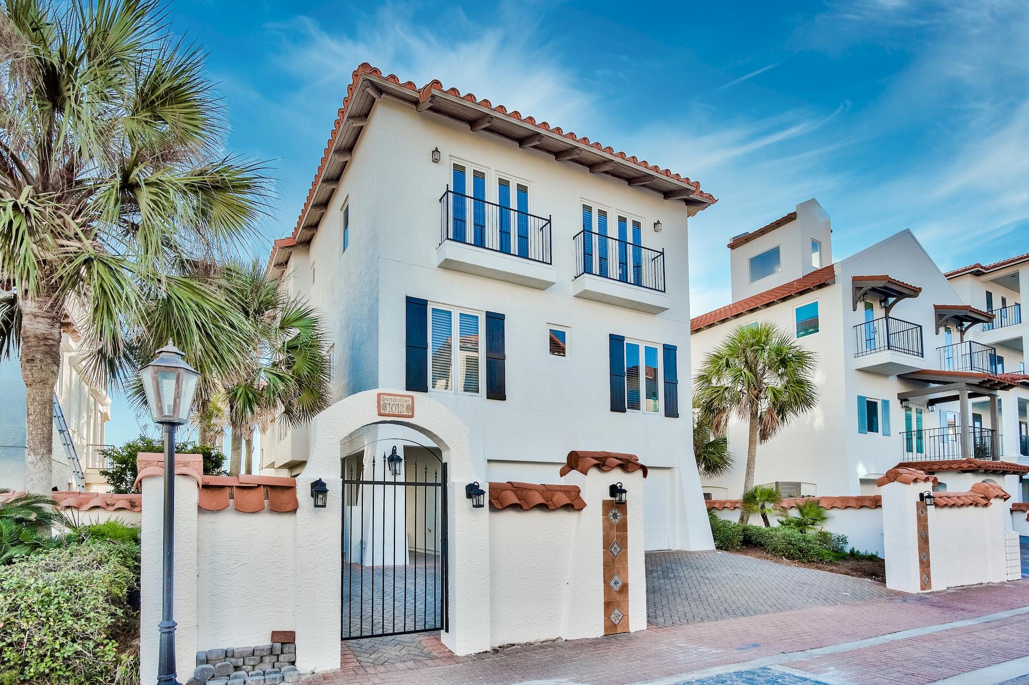 Luxury beach living at Vizcaya with views that will take your breath away! This home has everything that you would want in a beach retreat.  The expansive porches boast stunning views from multiple levels of this three story beach home.  A built-in grill on the upper deck with a propane grill & a ceramic egg smoker provide for optimal grilling. The home has a total of 4 bedrooms, all with en-suite baths, as well as a bonus room that would be an easy bunk room conversion.  You will also find a 1/2 bath on the first & second levels. The 2nd floor has an open floor plan which connects the kitchen to the dining and living area. The living room has stunning gulf views with a cozy fireplace for the winter months. New flooring recently installed along with decorative updates...move-in ready!