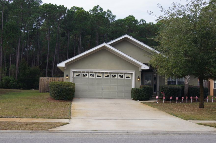 $5,000.00 BUYER INCENTIVE on purchase of home! Come enjoy this wonderful home, and call it yours! Seller is including up to a $5,000 buyer incentive to use towards closing, and a home warranty. Great open floor plan, upgraded flooring through out! This one is sure to impress! Have your privacy, as no one can build behind you, only a block from the bay.... What!? A lake view from the back porch too? High ceilings, textured walls, master bath includes-Jacuzzi tub and separate shower, double vanity,and a walk in closet. Call today, before this one gets away!