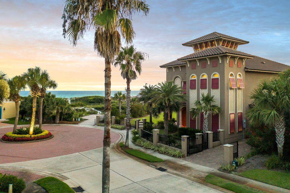 Sale includes the homesite to the South (Parcel ID 27-2S-21-42810-000-0340.) Evoking the charm of New Orleans Garden District, this Caribe masterpiece is tucked on a tree-lined street at the end of a quiet cul-de-sac, just steps from the neighborhood's private beach access. Encompassing 3,832 square feet, this four-bed, four-and-a-half-bath home sits on Rue Martine inside one of the most prominent gated communities in Miramar Beach. Built in 2016 by Boswell Builders, this fully customized home more than delivers on gulf views, which you can enjoy from nearly 1,800 square feet of balcony space. Walk through the home's impressive foyer, which provides access to first-floor guest accommodations and a bunk room, an oversized laundry room and an expansive wraparound porch.