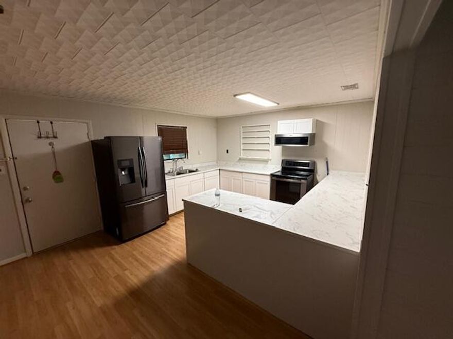 Rent entire 1,200sf consisting of three offices, 2 full bathrooms, full kitchen, washer/dryer, sunroom and patio. Gross lease - all utilities, internet and trash included. Also available as individual office spaces. Plenty of parking. Signage allowed - will need City/County approval. MTM options or longer lease (up to two years) available. More pictures coming soon.