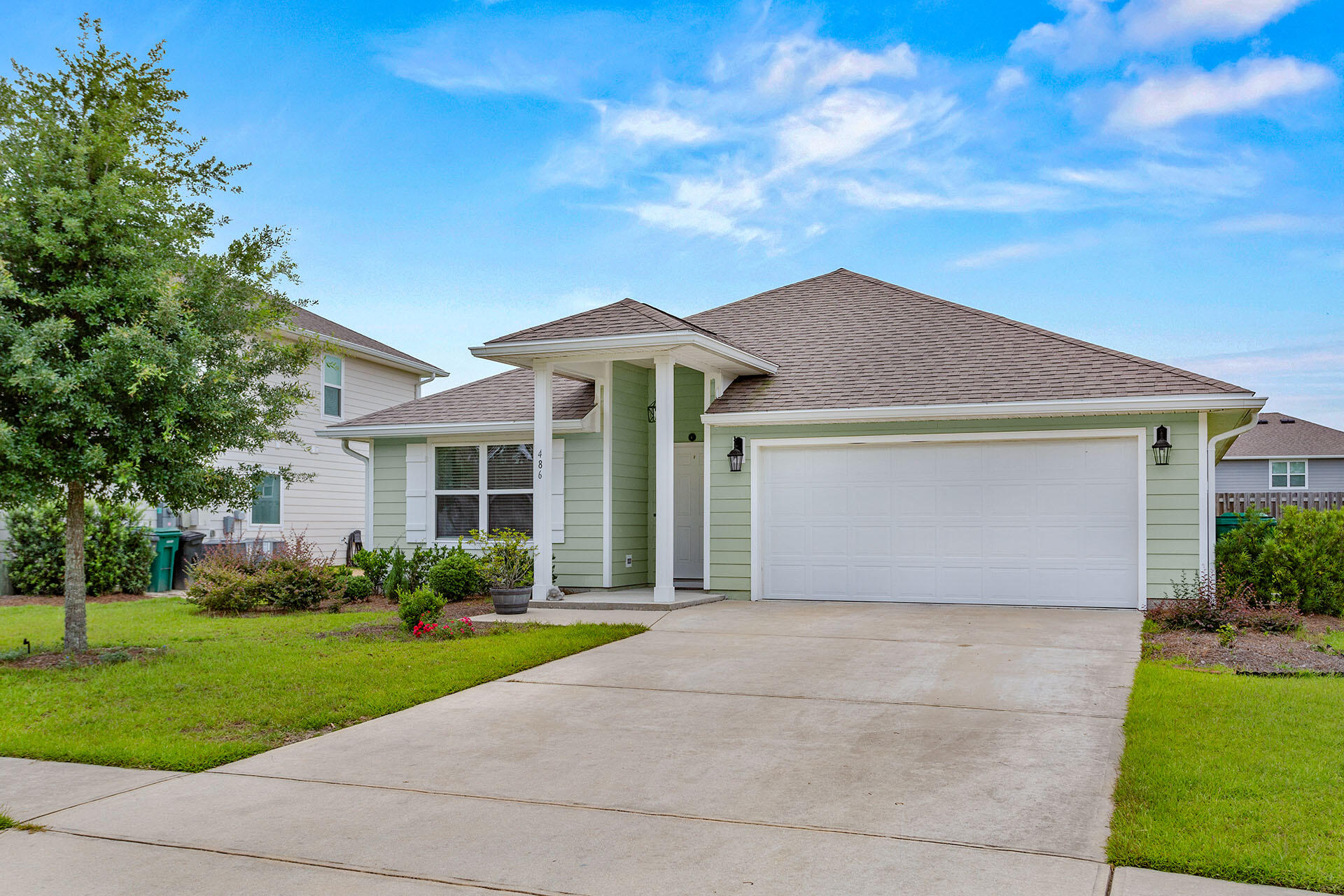 Modern 4-Bedroom Home Just 20 Minutes from the Beach - Loaded with Upgrades & Community Perks! Low HOA DuesWelcome to this beautifully maintained 4 bedroom, 2 bathroom home featuring a spacious 2 car garage and a fully privacy fenced backyard. Enjoy outdoor living year round with a screened back porch, perfect for relaxing or entertaining.Inside this open kitchen boasts upgraded leathered granite countertops and a walk-in pantry, ideal for the home chef. The open floor plan flows seamlessly through the main living spaces, offering both comfort and functionality.Located in a vibrant community with tons of amenities, you'll have access to a large resort style pool, fitness center, tennis courts, clubhouse, walking trails, dog park, and even a neighborhood brewery and general store.