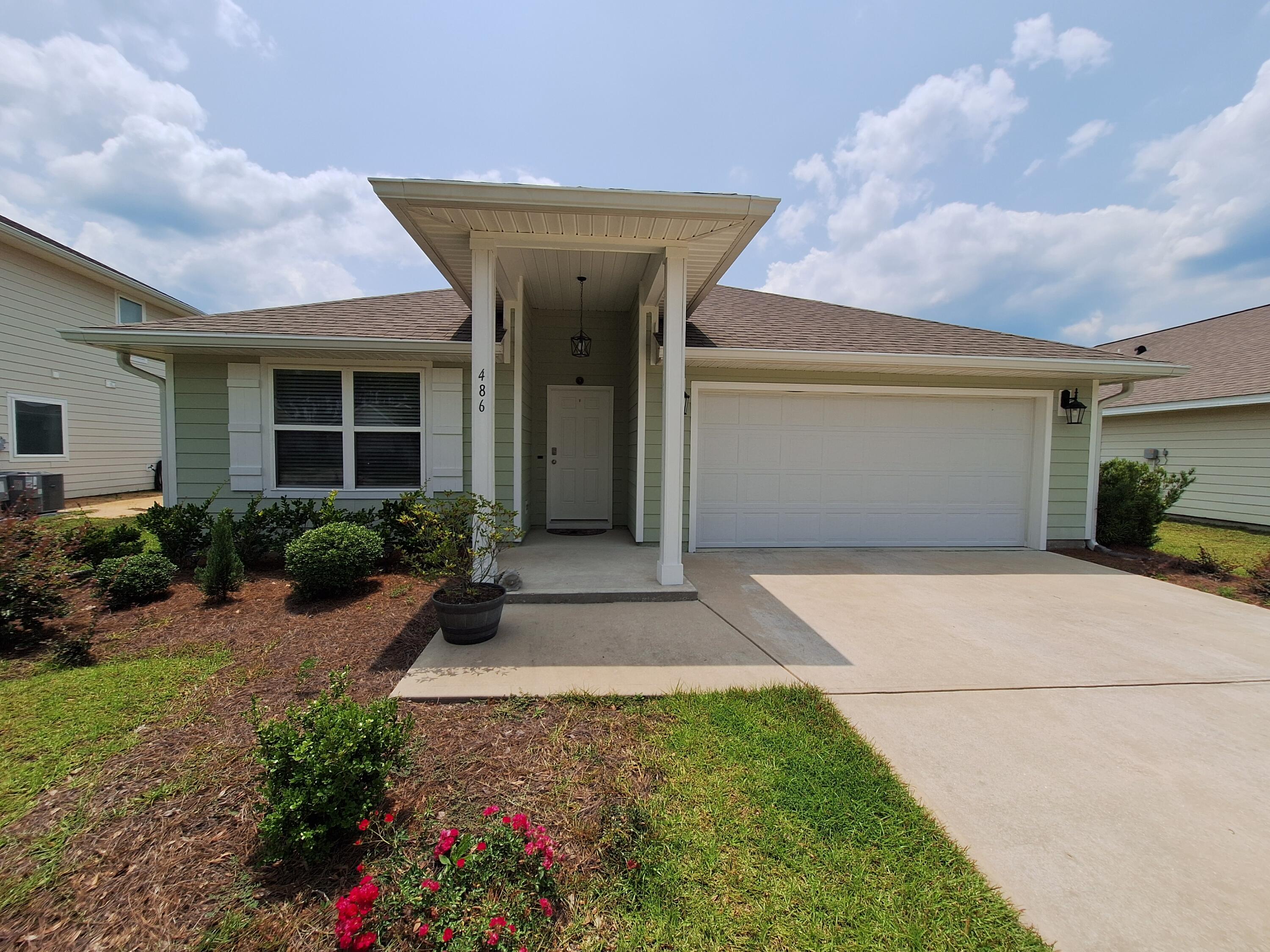 Modern 4-Bedroom Home Just 20 Minutes from the Beach - Loaded with Upgrades & Community Perks! Low HOA DuesWelcome to this beautifully maintained 4 bedroom, 2 bathroom home featuring a spacious 2 car garage and a fully privacy fenced backyard. Enjoy outdoor living year round with a screened back porch, perfect for relaxing or entertaining.Inside this open kitchen boasts upgraded leathered granite countertops and a walk-in pantry, ideal for the home chef. The open floor plan flows seamlessly through the main living spaces, offering both comfort and functionality.Located in a vibrant community with tons of amenities, you'll have access to a large resort style pool, fitness center, tennis courts, clubhouse, walking trails, dog park, and even a neighborhood brewery and general store.