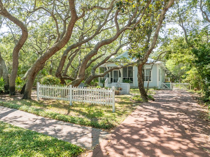 Price Improvement! Discover your dream home or investment property with this Florida cottage, nestled in the sought-after community of Kokomo Kove. Located on one of the only roads without through traffic in all of Destin's Crystal Beach, the white sand and emerald water is only ~750 feet away! Kokomo Kove owners have DEEDED BEACH ACCESS at the end of the street, which is shared by only a small number of houses. It's a rare find in the area! This home is being sold fully furnished and features two large bedrooms, two full bathrooms, and the convenience of one-floor living. The open concept floor plan includes a joined great room, kitchen and dining area with a large kitchen island, which is perfect for hosting and entertaining. Recent updates include a new roof in late 2022, all... ...new interior paint, updated furniture, TVs, and new outdoor furniture within the past year. A brand-new patio and walkway were also installed in the spring of 2024. 

The covered and screen front porch overlooks the beautiful southern live oaks and is a perfect way to start your morning. When all is quiet at dawn, the waves can be heard while you sip your coffee. Meticulously maintained, this home is so close to the community's deeded beach access, restaurants, family entertainment, and much more. Schedule a viewing today and fall in love with your future coastal retreat! 
