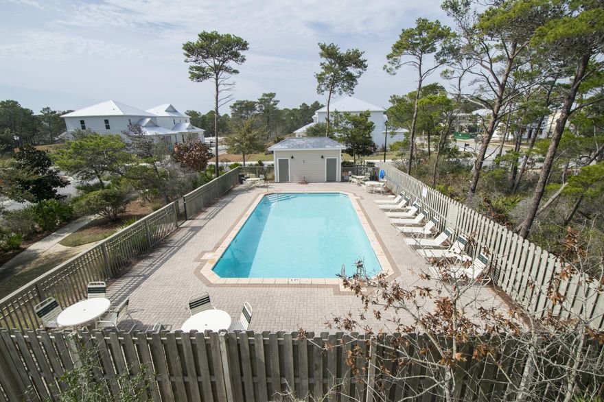 his is an opportunity to purchase a new contruction home with thoughtful finishes including beautiful coastal shiplap, wood floors, detailed trim work and beautiful fixtures. This home is located less than half a mile from the Gulf and Gulf Place town center. Whether you are looking for a family beach home or a great rental investment, this home has it all. The open living/dining/kitchen provides ample space for the whole family. Some highly desirable features include a bedroom and full bathroom on the first floor. There is also a back yard that will accommodate outdoor dining and living space. The second level offers a south facing owners suite with a private balcony and two additional bedrooms.