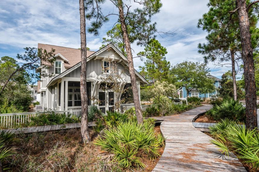 This stunning home in sought after WaterSound West Beach was masterfully designed for the coastal lifestyle. Grand features like soaring ceilings, abundant windows offering natural light, and beautiful millwork exemplifies the casual elegance. The gourmet kitchen offers a large island, custom cabinetry, Viking appliances, wine refrigerator, ice maker, wet bar and two oversized pantries. The great room opens onto a large screened porch with both sitting and dining areas making this home perfect for entertaining.  Beautiful hardwood flooring flows throughput the home except for the baths and laundry which feature tile flooring. The first floor  master suite includes a walk-in closet and a well appointed master bath with gorgeous tile work, large soaking tub, and oversized marble shower.