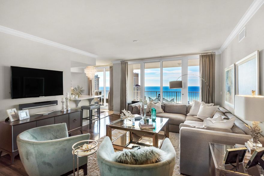 Breathtaking Views from the 17th floor of the much Sought after One Beach Club Drive Condo. Update throughout in stunning coastal inspired fixtures, lighting and color palette. Soft grey toned wood flooring flows through the living spaces and bedrooms. Updated Kitchen with breakfast bar and cabinetry topped with quartz and newly updated stainless appliances. The Master suite and guest suite both have private access to the generous balcony with endless views of the Emerald Gulf waters, Beach, and Sandestin Resort. OBCD offers a heated and cooled storage space in the building, as well as gated entrance security. OBCD owners have the very best amenities which include private Tennis and Pickle Ball courts, Fitness room, Media Room, Social Activities Room with Pool table, and wonderful Pool.