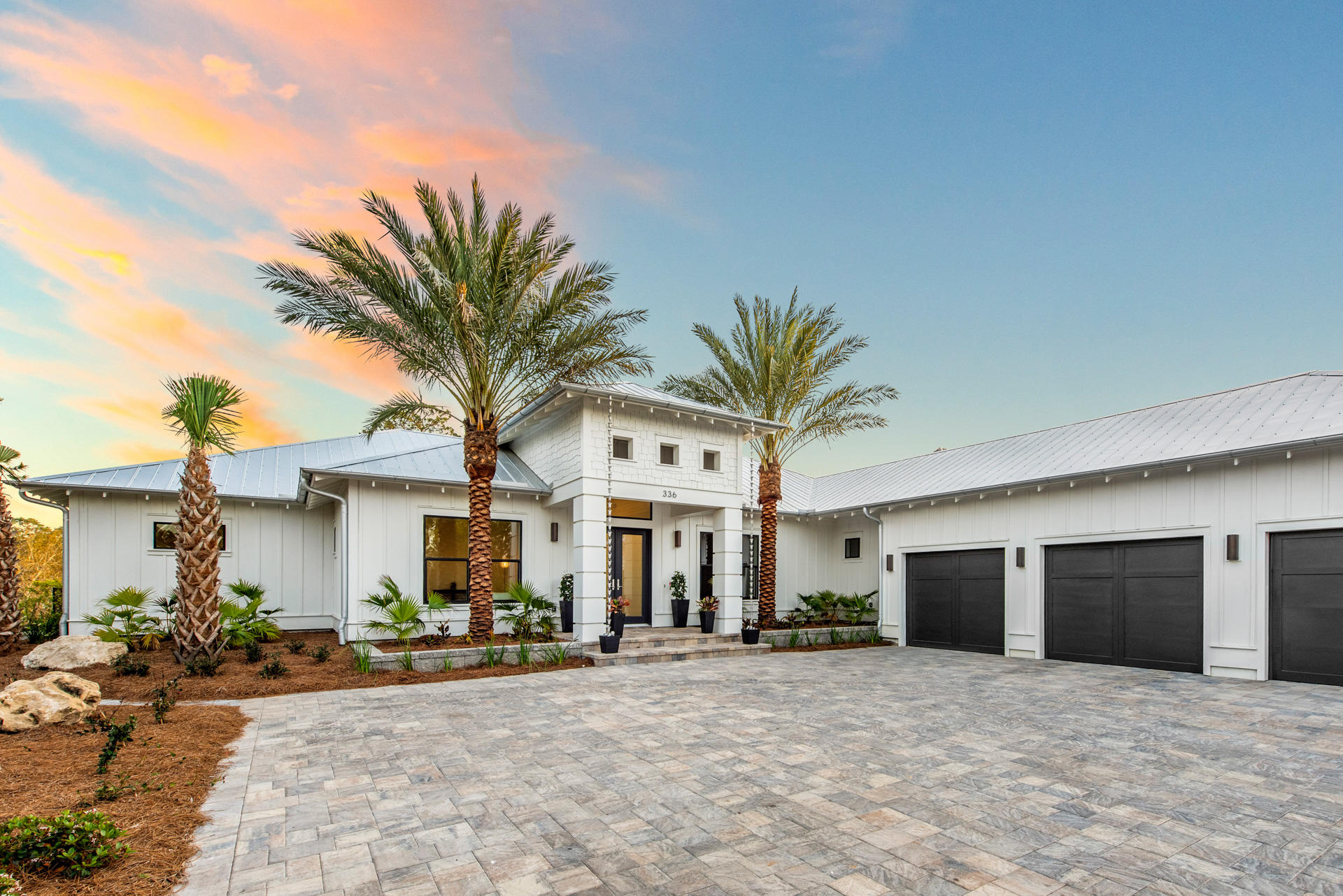 Ideally situated waterfront in Driftwood Estates, this stunning new construction home includes 100ft of water frontage on Buck Bayou, with rare deep water access. A 42' covered slip that allows a boat up to 50 ft in size, alongside a 250 pound ice maker with fish freezer in the garage, make this home ideal for an avid fisherman. The home features a clean, modern style with a natural color palette, leaving each room feeling spacious and inviting. Experience expansive water views from the kitchen, dining, living, and master bedroom, providing plenty of natural sunlight throughout the home's open floorpan. A large master bedroom with vaulted ceilings leads into an elegant master bath complete with rain shower, and spacious stand alone bathtub.