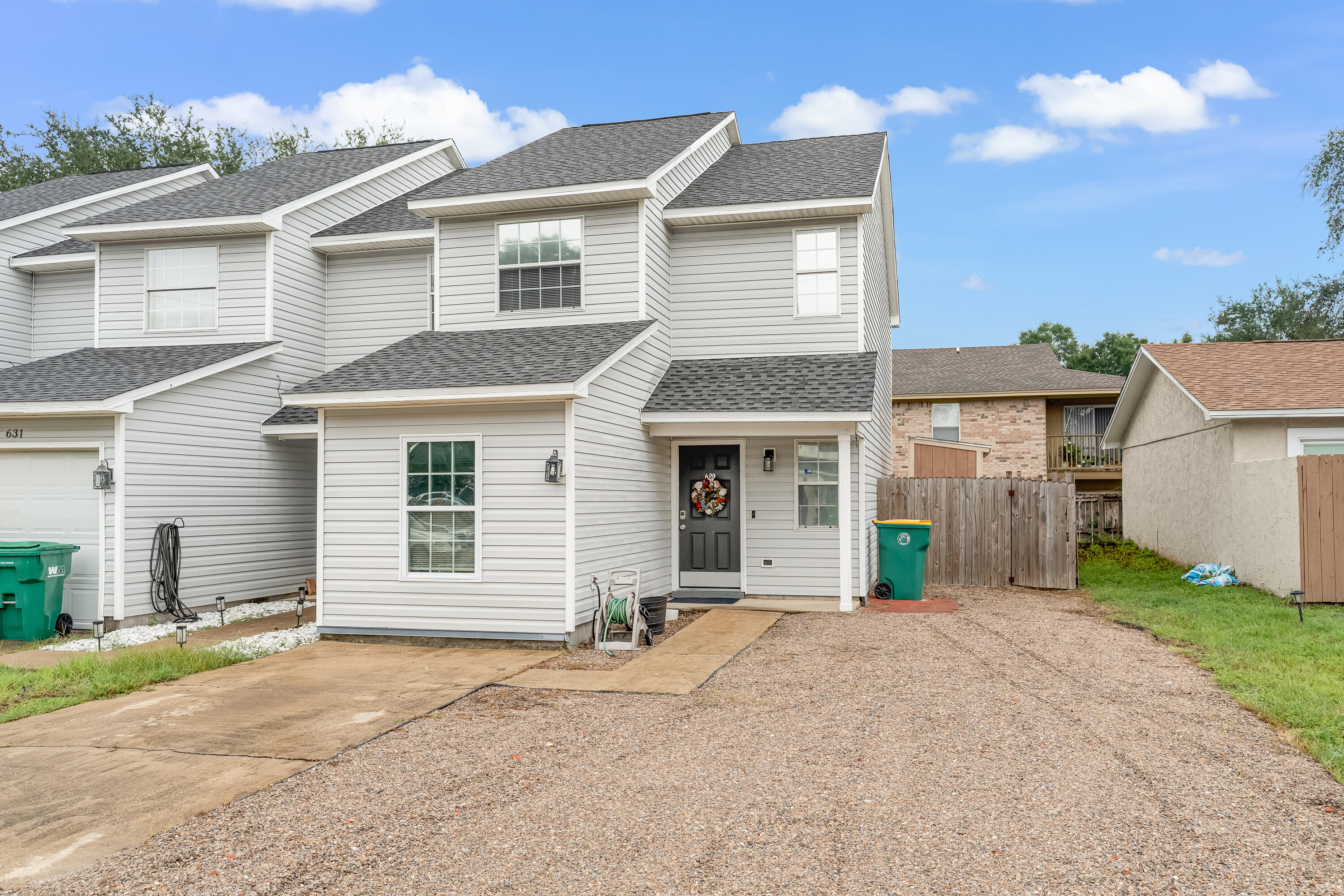SELLER IS WILLING TO PAY UP TO $7000 IN BUYER'S CLOSING COSTS with acceptable offer. Welcome to this beautifully maintained end-unit townhome. Enjoy durable LVP flooring throughout and fresh paint downstairs that creates a clean, modern feel. The fenced-in back and side yard provide privacy and room to relax or entertain. The kitchen is equipped with all stainless steel appliances, while the spacious master bedroom features double closets with mirrored sliding glass doors. The garage has been converted into a bonus room (not included in square footage) with added insulation on exterior walls--perfect for a home office, extra bedroom, or flex space to fit your needs. Major systems have been updated for peace of mind: roof (2020), HVAC (2019), and water heater (2021). As an end unit, you'll also benefit from extra natural light and added outdoor space. Don't miss the opportunity to make this move-in ready home yours!