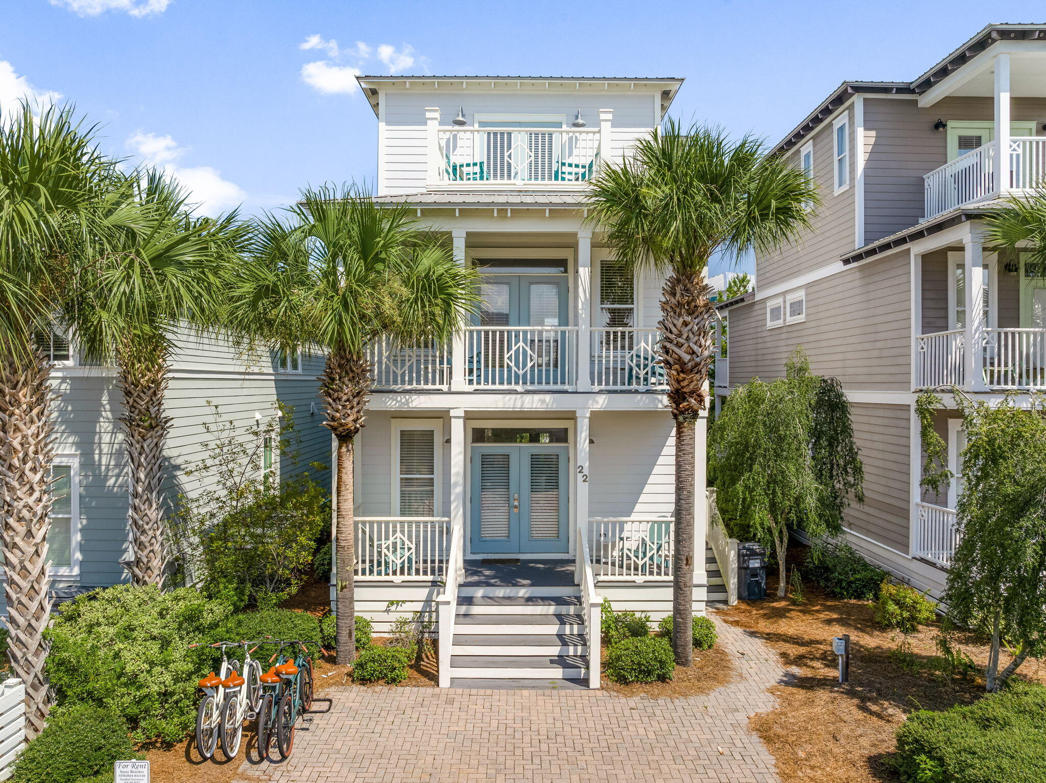 Beautiful three-story Seacrest Beach residence offering four bedrooms, a bunk room, and four bathrooms. Nestled between Alys Beach and Rosemary Beach, this is coastal living at its finest! Each bedroom opens through elegant French doors to its own private balcony, filling the home with natural light and coastal breezes. The open floor plan features soaring ceilings, a bright chef's kitchen with beautiful countertops and stainless-steel appliances, and six spacious porches perfect for morning coffee or evening sunsets. Beautifully decorated and thoughtfully laid out, this home is equally ideal as a primary residence or an investment property. Enjoy community amenities including a resort-like pool and deeded beach access to Seacrest Beach's private shoreline on the south side of 30A. Plus, on-demand tram stops throughout the neighborhood for easy, carefree travel!