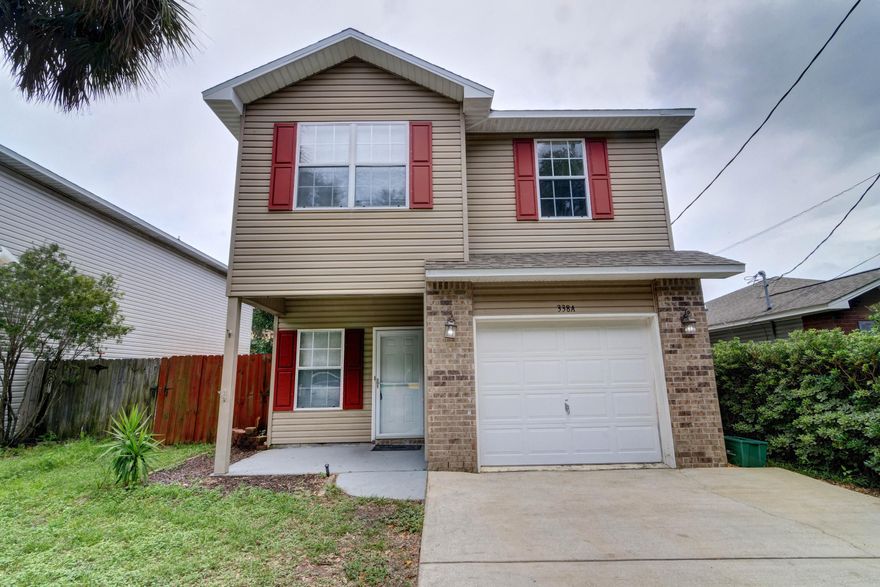 Want a short commute? Welcome to this charming 3 Bed, 2.5 Bath single family Mary Esther home only 5 minutes from Hurlburt Field that even has a walking path to Florosa Elementary nearby! A large entryway with 16x16 tile greets you with a broad open staircase. Continue past the door that accesses your well sized one-car garage and just past the half bath, is the open kitchen which boasts tiled floors, granite countertops, and tasteful tiled backsplash. The granite breakfast bar overlooks the formal dining area and is open to the large living room with large windows allowing for plenty of natural sunlight streaming in from the fenced in backyard. Hard surface flooring extends throughout the entire downstairs, and off the living room is a bonus walk-in storage area. Upstairs you'll find all 3 bedrooms as well as conveniently the large laundry room (no taking laundry up and down stairs!) and on the landing you'll find a loft/work space. The spacious master bedroom features a walk-in closet and full bath featuring double vanities. Down the hall are two additional nice sized bedrooms and a full bath. Perfectly located near the beautiful emerald coast beaches, shopping, and military bases, this home is a must see!