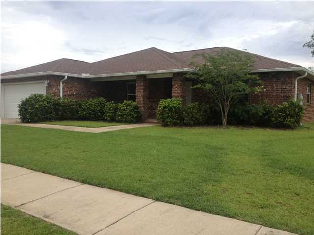 Stunning 3 bedroom/2 bath all brick home with mature landscaping, sidewalks and a grand porch entrance! NOT A SHORT SALE!! Wide foyer boasts double glass inset french doors that lead to an oversized office/bonus room on one side and spacious dining area on the other. The dining space connects to an open floor plan kitchen/living area. Along with plenty of cabinet space, the kitchen features a massive double door pantry, oak 42'' upper cabinets with stainless hardware, a bar for extra seating, stainless steel appliances (dishwasher, microwave, flat top stove and frig with exterior water), crown molding, can lights, decorative ledges and arched entry ways. Throughout this clean and well maintained home you will find bull nosed corners, upgraded neutral carpeting, neutral paint,