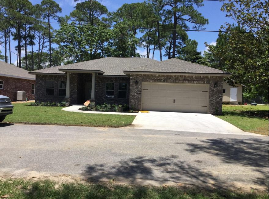 NEW CONSTRUCTION by Local custom Home Builder. 1 of 3 BRAND NEW All brick homes 4BR, 2BA Under construction and ready for move-in early June 2020. Close to military bases beaches and shopping. Quality Construction with lovely features throughout including an Open concept floor plan with 10' heights in the main living area, 9'ceilings in remaining rooms. Trayed ceilings in living room and master bedroom. Other features include Luxury ''Life Proof'' vinyl plank flooring throughout with plush carpeting in bedrooms.Kitchen and bath have ALL WOOD '' shaker style'' cabinetry with soft close doors. 10' Center island with pendant lighting, and Quartz countertops. Samsung stainless appliance package including a French Door refrigerator. Oversized pantry in kitchen, Large crown molding in